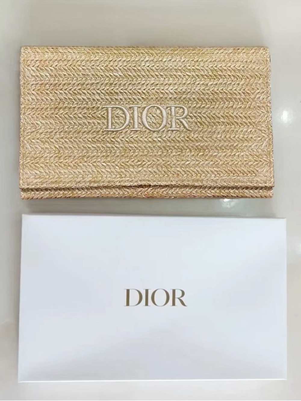 Dior beauty straw pouch